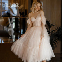 Robe corset mariée rose en tulle avec décolleté cœur et manches dénudées